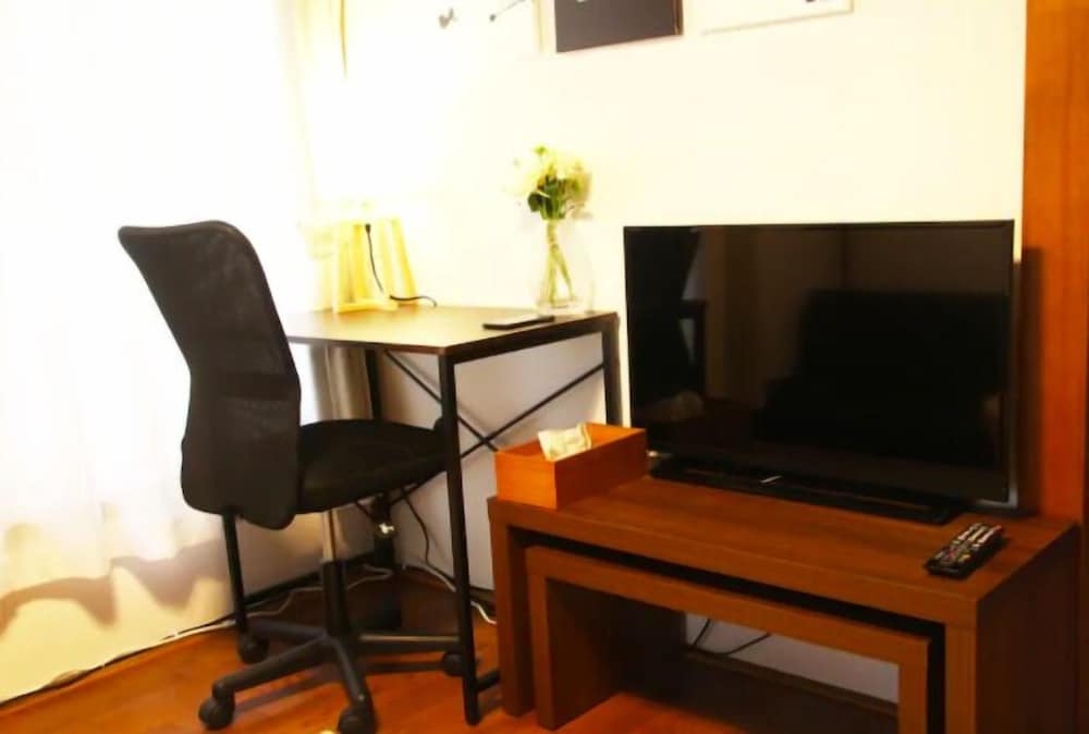 Фото Yoshinaga Apartment 103