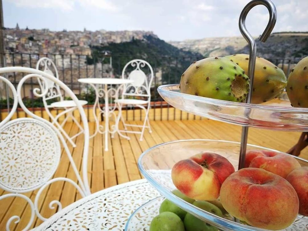 Фото Reusuite Authentic Sicilian Hospitality