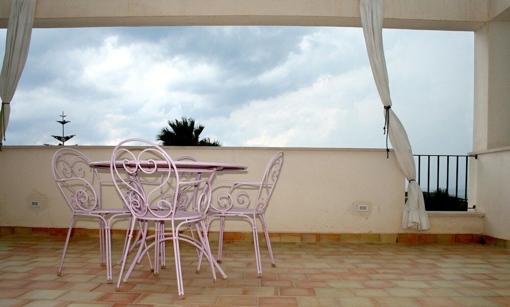 Фото Punta Bianca Suite&Home Experience