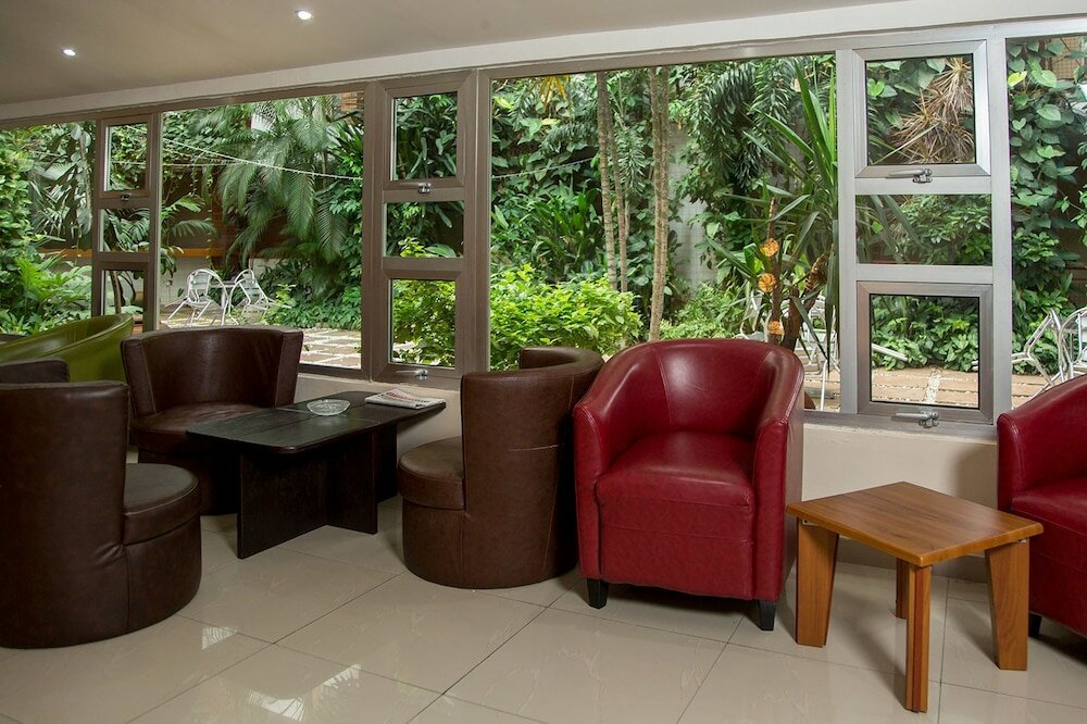 Фото La Cour Hotel Apartments