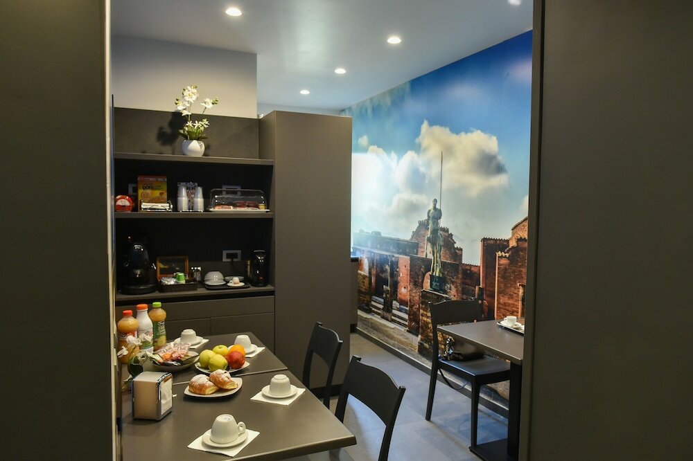 Фото Pompei Inn Ruins Luxury Suites