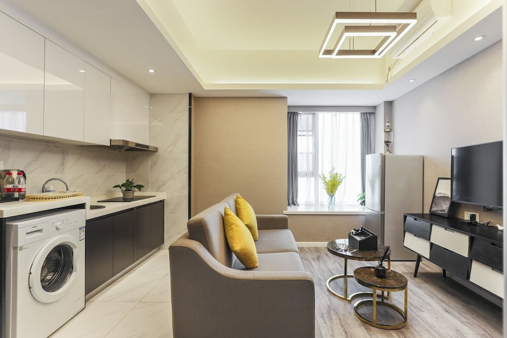 Фото Yue Qi Hotel Apartment