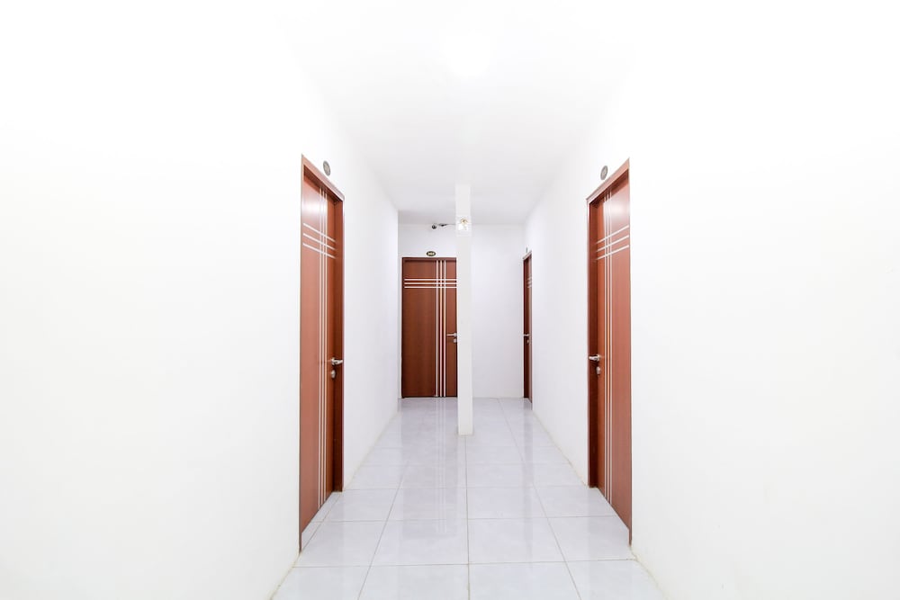 Фото Oyo 217 A1 Hotel