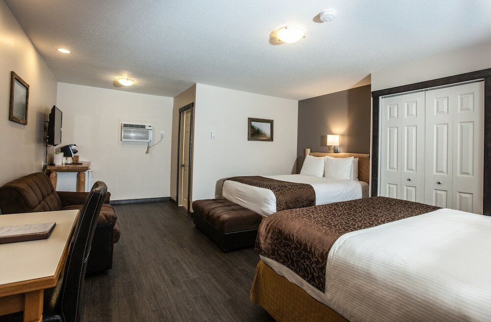 Фото Swiss Chalet Motel