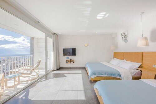Гостиница Butterfy Seaview Resort Villa в Юньнани