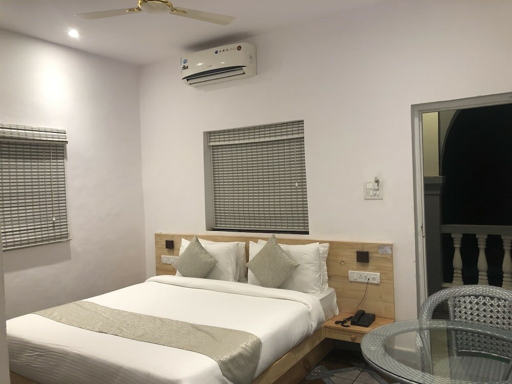 Фото Inn Morjim a Boutique Beach Hotel