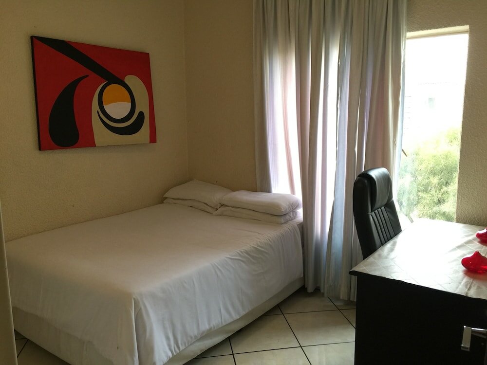 Фото Tntee Apartments