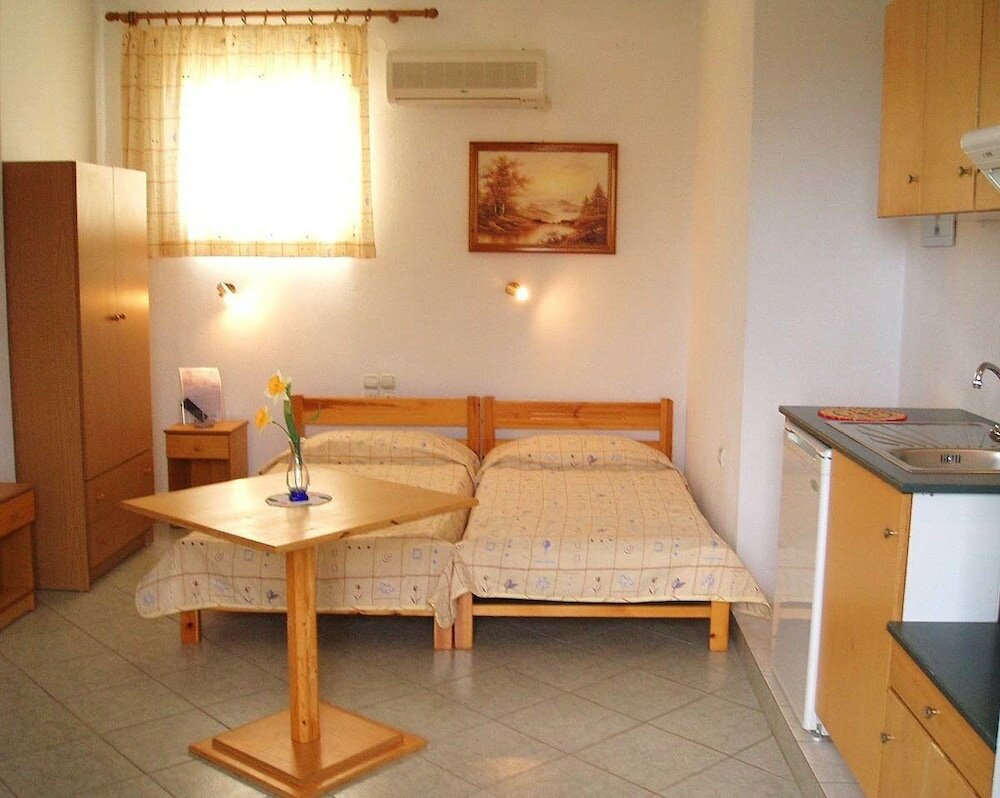 Фото Alexandros Rooms & Studios