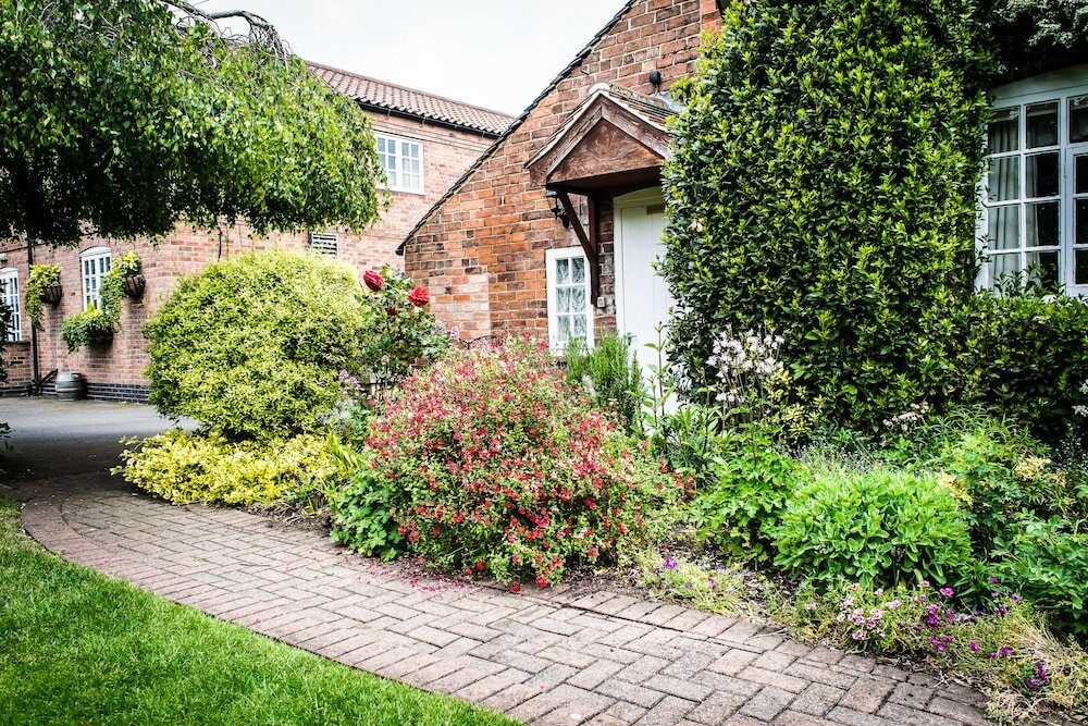 Фото The Cottage Hotel