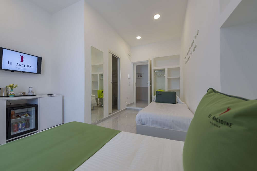 Фото Le Angioine Rooms
