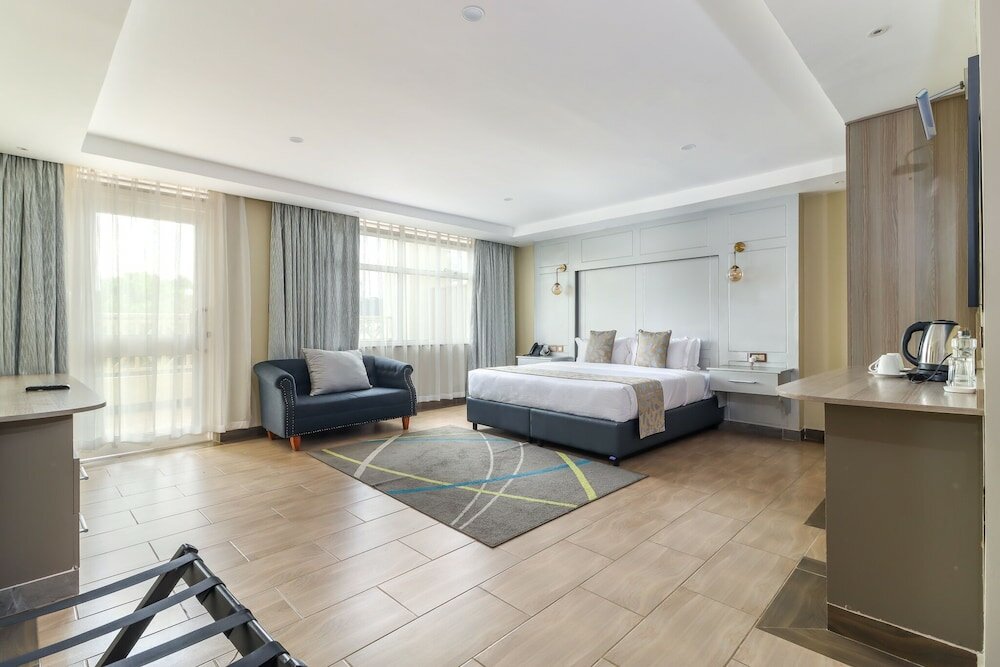 Фото Dallas Premiere Hotel