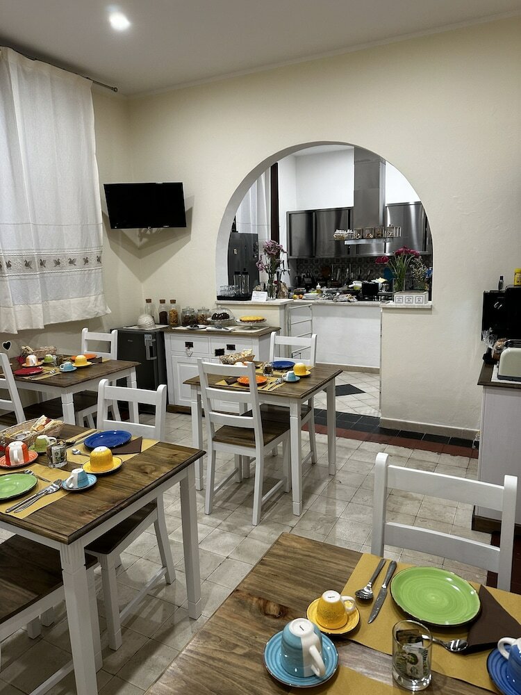 Фото Domo Achenza Guesthouse