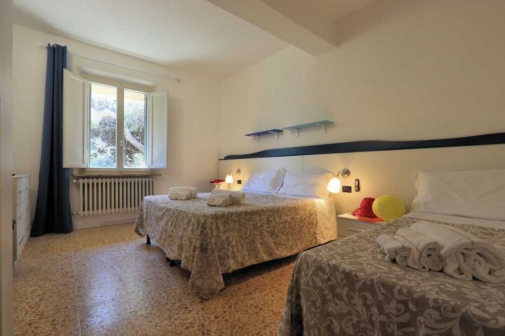 Фото Bed and Parking Cecina Rooms