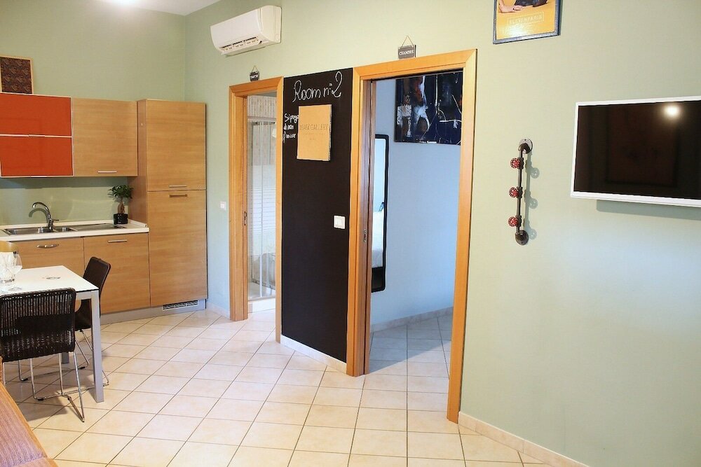 Фото Colonna Rooms & Apartment