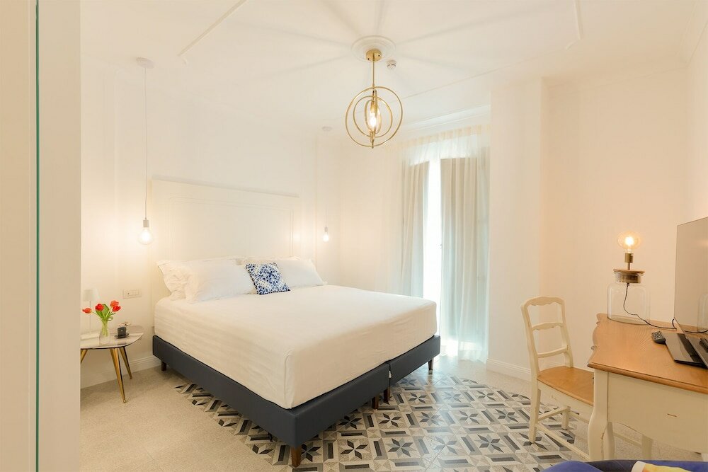 Фото CasAunoE Boutique Hotel