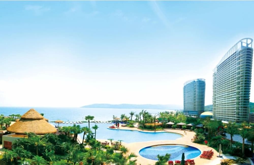 Фото Xiaoyi Hotel Apartment