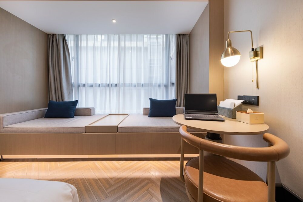 Фото Gz Baiyun Airport MeHood Liz Hotel T1