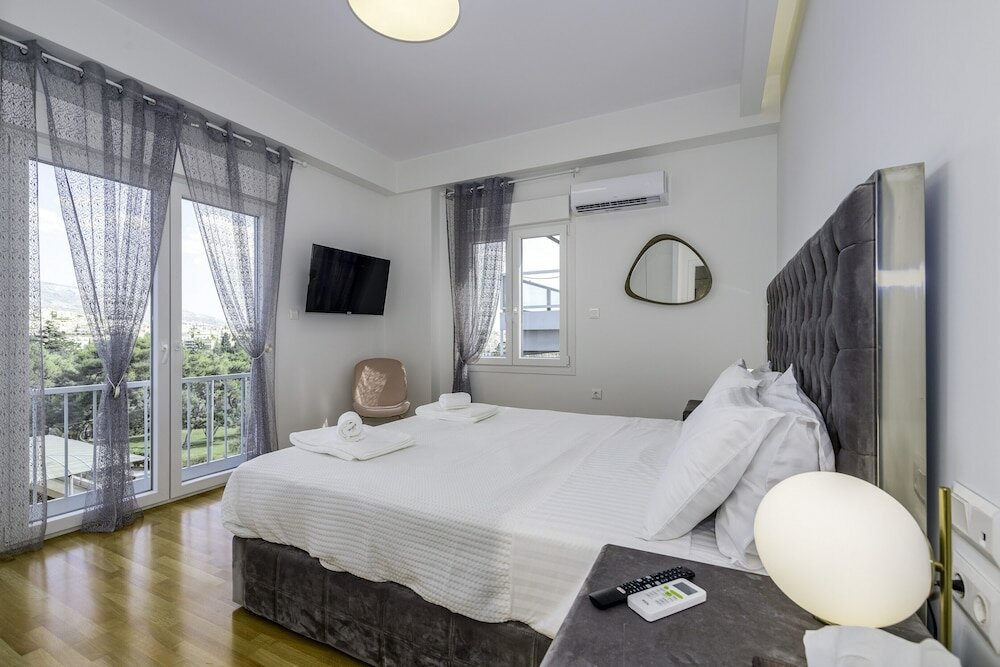 Фото Lush Sapphire apt in the heart of Athens