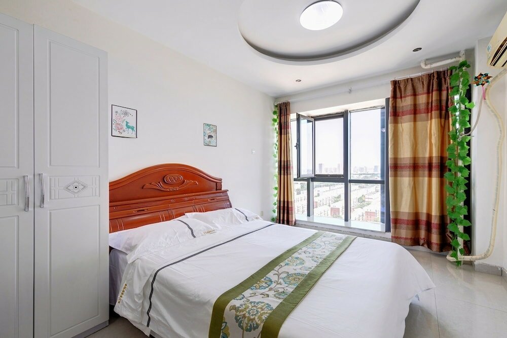 Фото Xiwangju Apart-hotel