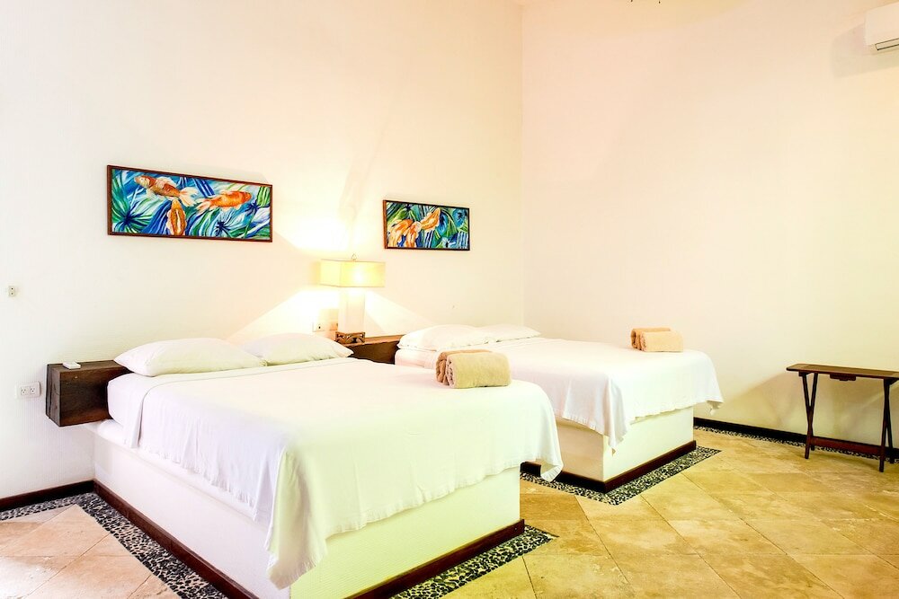 Фото Casa Caleta Akumal Villa EN Laguna