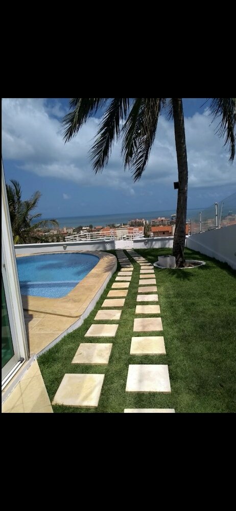 Фото Vacation Home EN Porto das Dunas