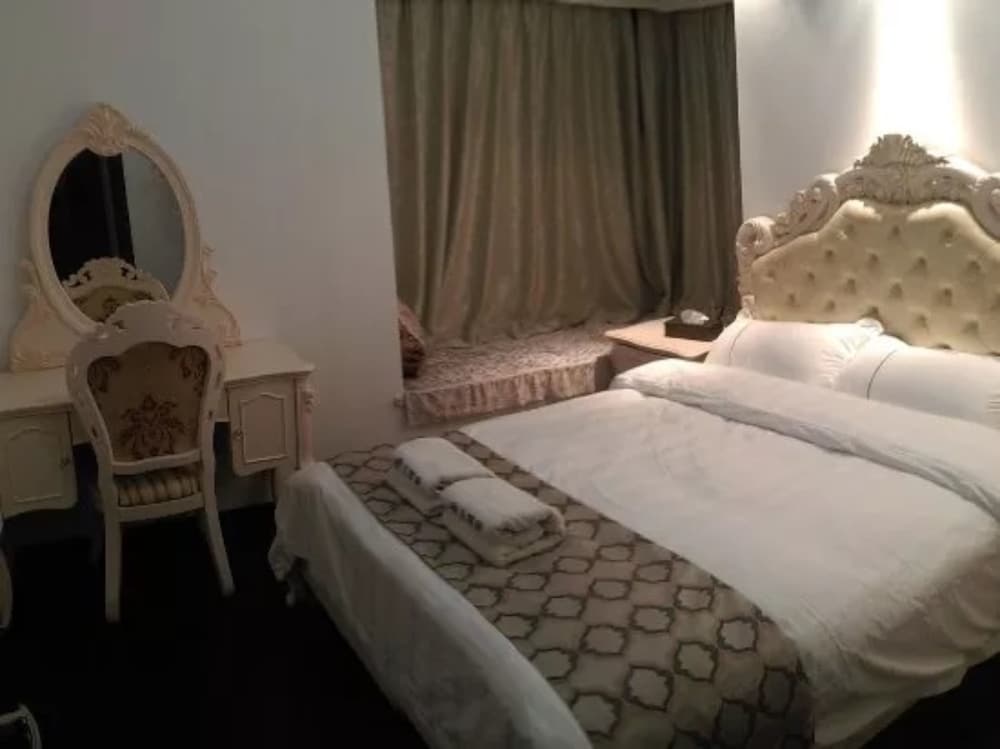 Фото Yumi Apartment-Quan Tian Xia Branch