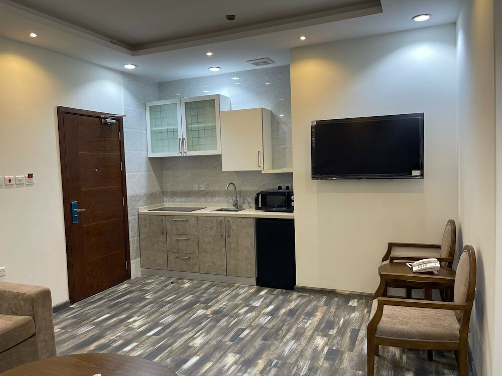 Фото New Holiday Serviced Apartments