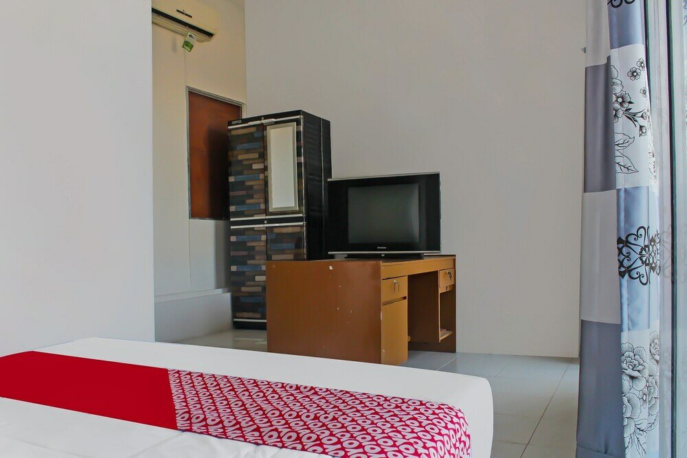 Фото Oyo 92593 Penginapan Sultan Haji 1