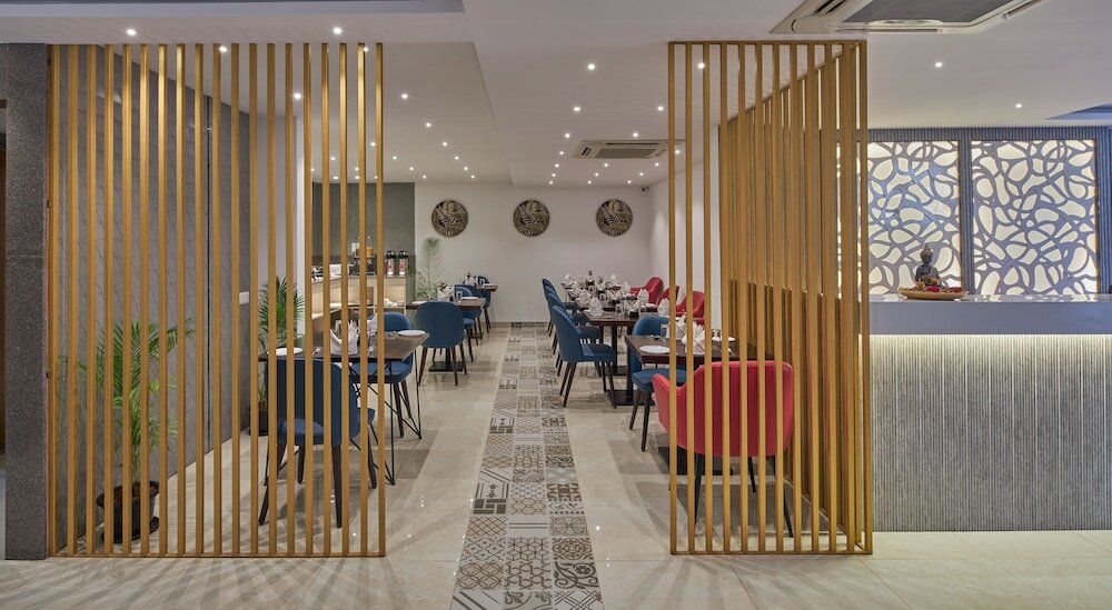 Фото Regenta Inn 4th Block Koramangala