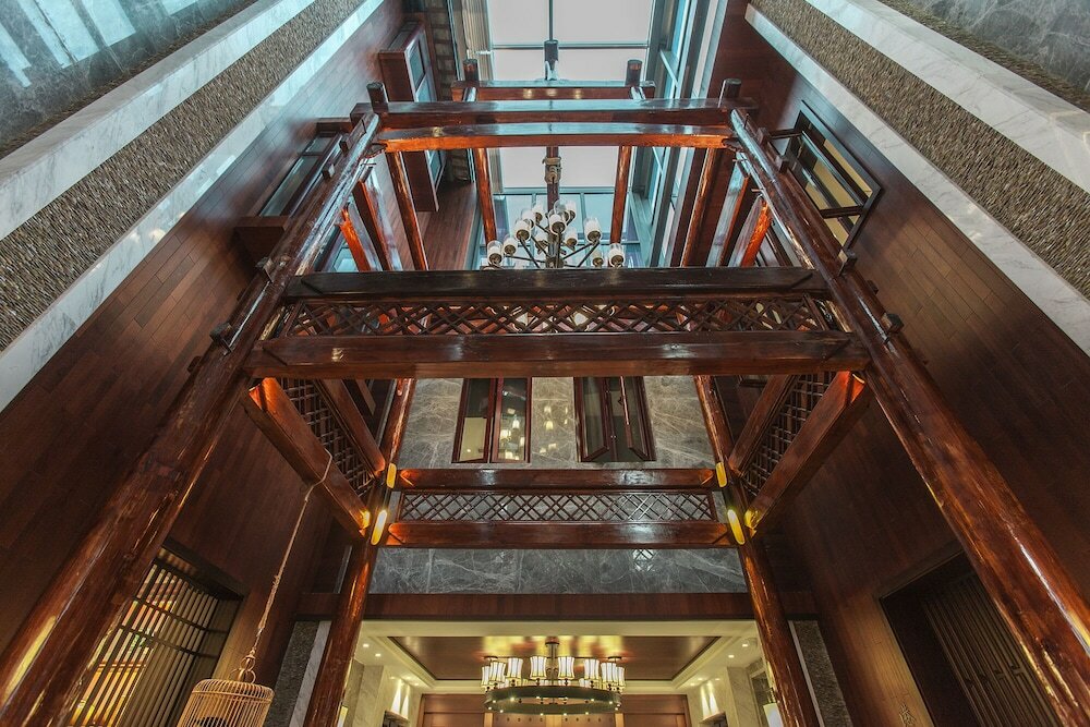 Фото Hejing Chengshang Generations Hotel