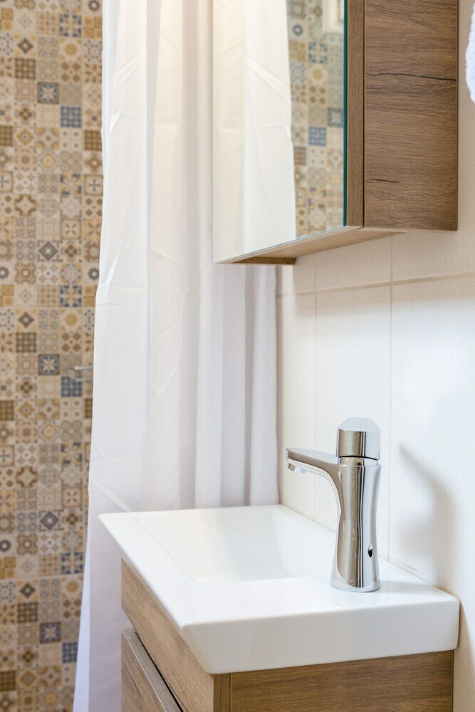 Фото Grandma's Chic & Bright Athenian Home with a Patio