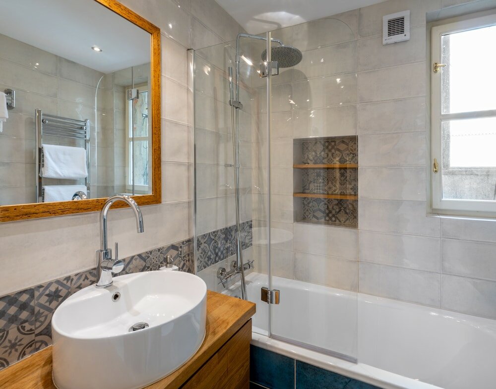 Фото Mordecai Twelve Apartments by Adrez Living