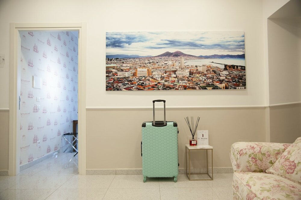 Фото Le Angioine Rooms