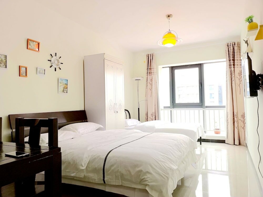 Фото Xiwangju Apart-hotel