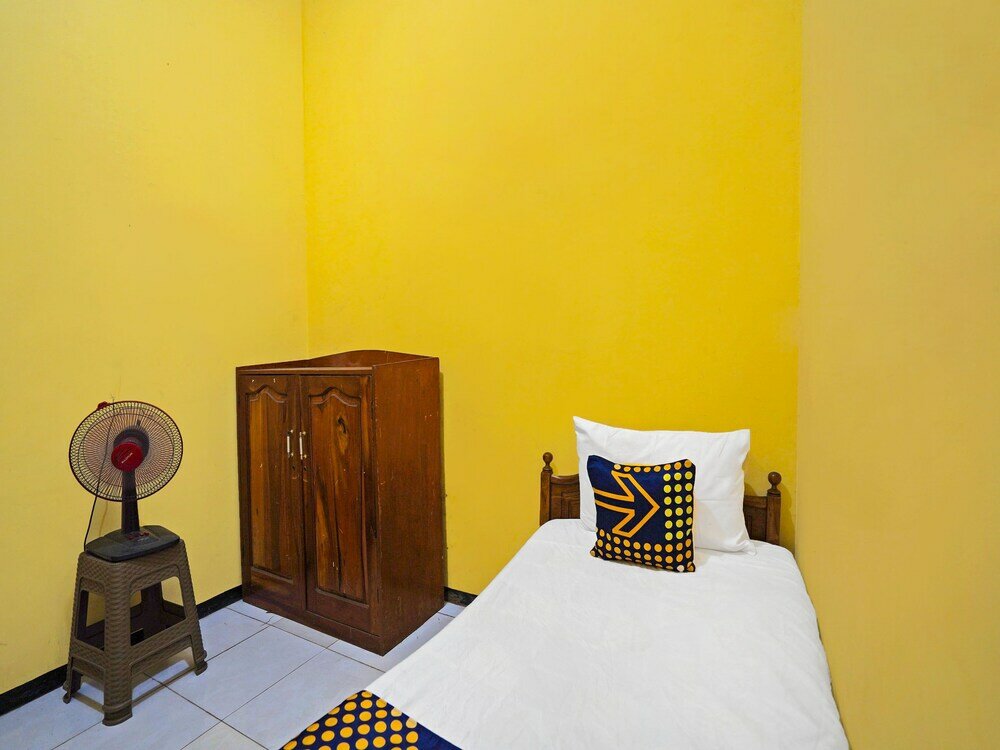 Фото Spot On 91869 Insan Mulia Kost Syariah