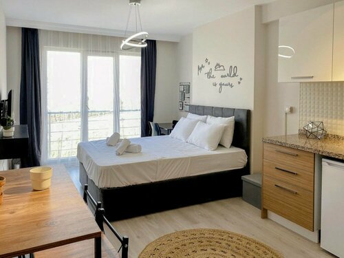 Апартаменты Cozy and Modern Studio With City View in Atasehir в Аташехире