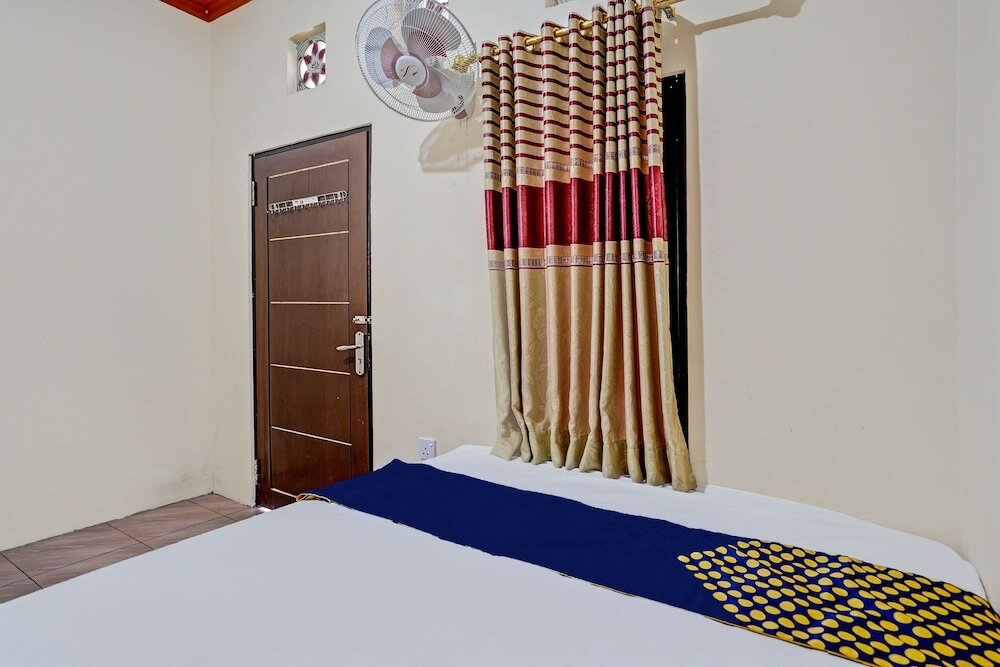 Фото Spot On 92527 Penginapan Kangean Syariah