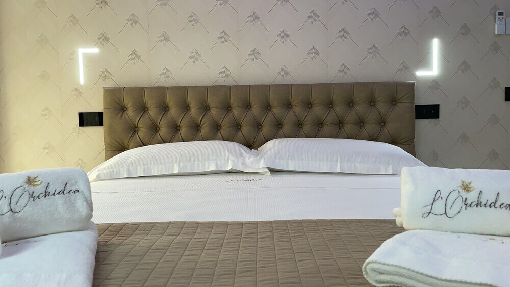 Фото B&b L'Orchidea