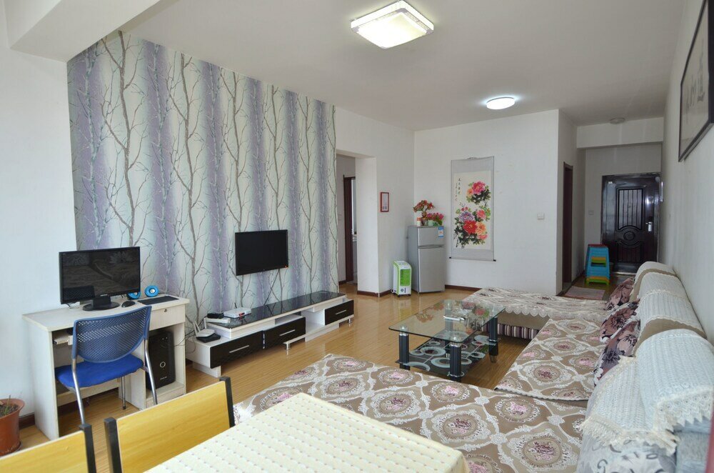 Фото Lanzhou Longshang Mingzhu Apartment Three-bedroom suite