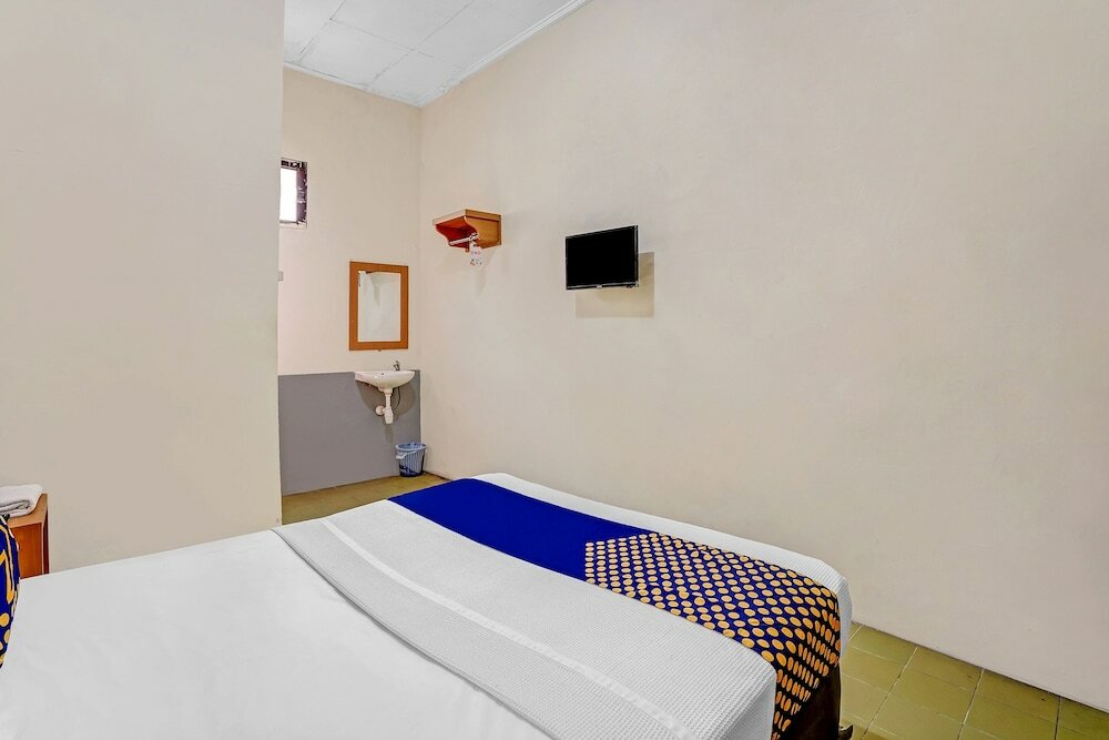 Фото Spot On 90098 Anak Mama Guesthouse