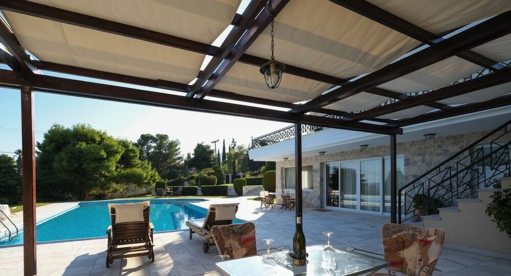 Фото Sublime Luxurious homm Villa in Paiania