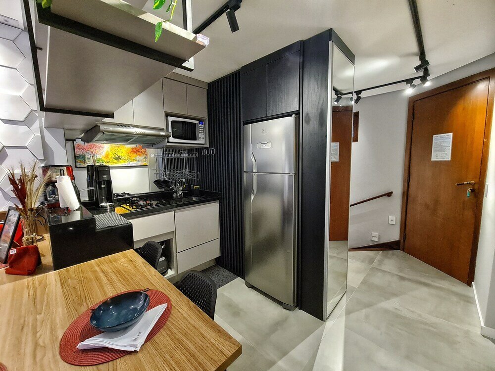 Фото Dúplex Luxo com Piscina Aquecida, Lareira e Wifi