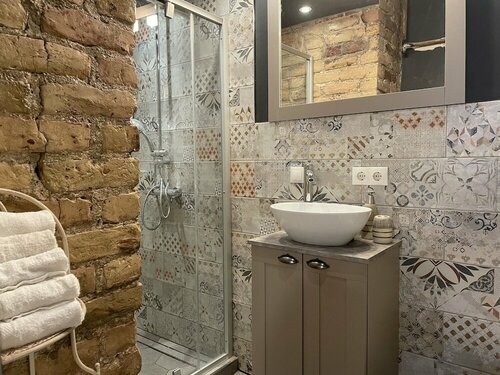 Апартаменты Изысканные апартаменты с 1 спальней и садом в центре города в Риге