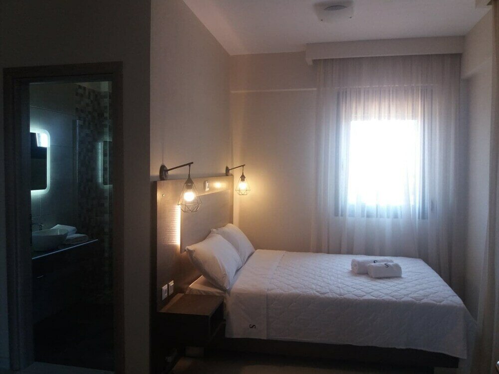 Фото Sinodinos Deluxe Apartments