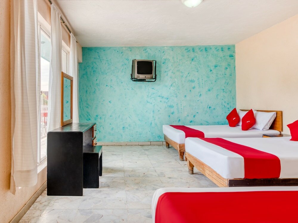 Фото Capital O Hotel La Siesta, Gómez Palacio