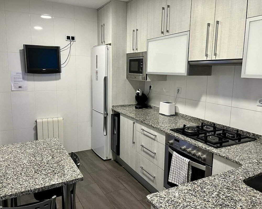 Фото Amplio apartamento cerca Fira y Centro