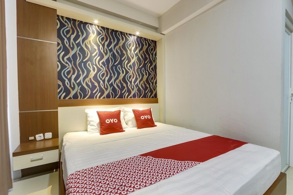 Фото Oyo Flagship 90973 Hotel Karunia Pkpri