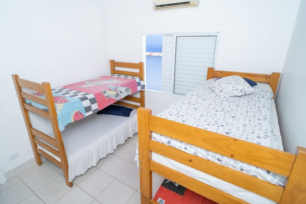 Фото Aconchegante casa em condomínio fechado com lazer completo