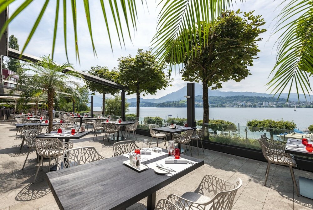 Фото Hermitage Lake Lucerne - Beach Club & Lifestyle Hotel
