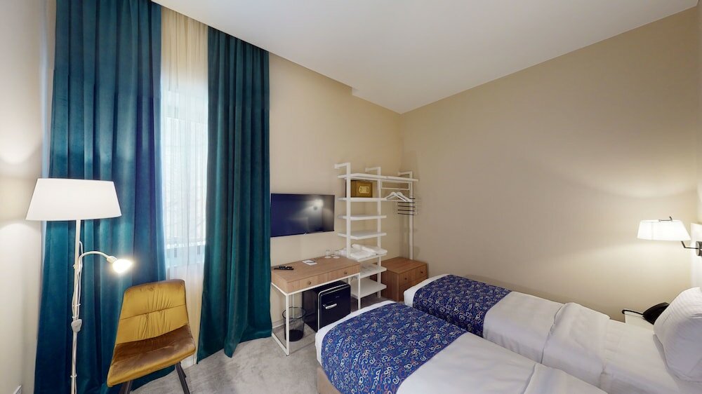 Фото Epigraph Town Hotel